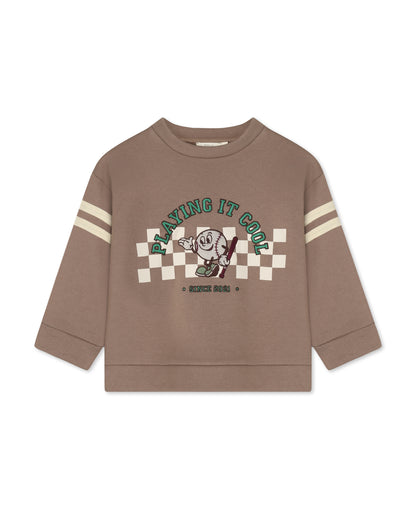 Alvin Cool Sweatshirt in Pine Bark, a brown sweatshirt with 'Playing it cool' print and striped sleeves, front