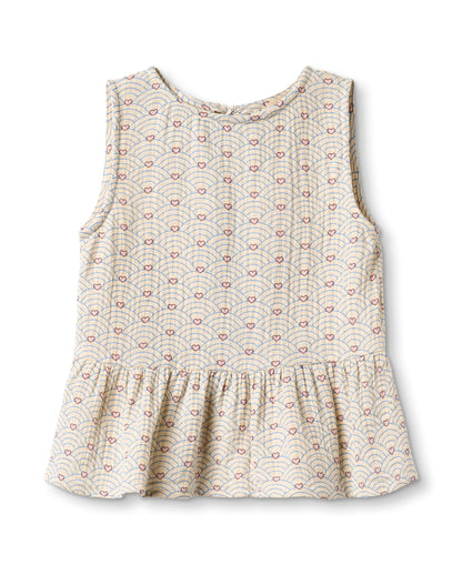 Bridget Top in Sandshell, a sleeveless cream printed top with a peplum hem, front