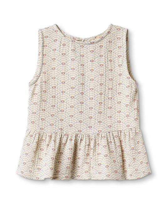 Bridget Top in Sandshell, a sleeveless cream printed top with a peplum hem, front
