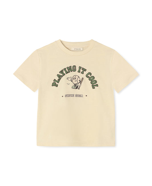 Sommer Cool T-shirt in Sandshell, a cream tee with 'Playing it cool' print, front