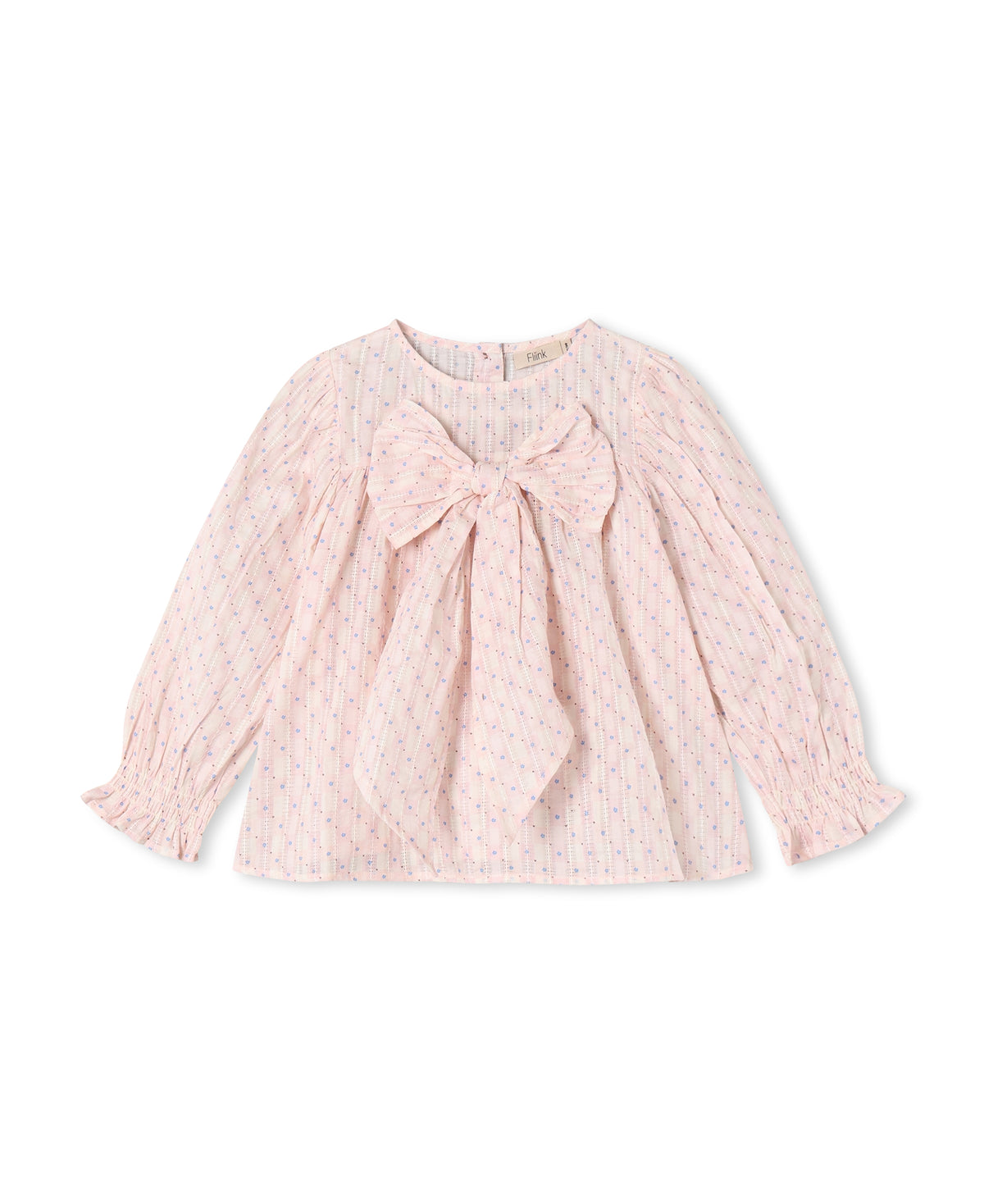 Chalk pink long-sleeved blouse with a large bow at the chest and smocked cuffs, shown flat